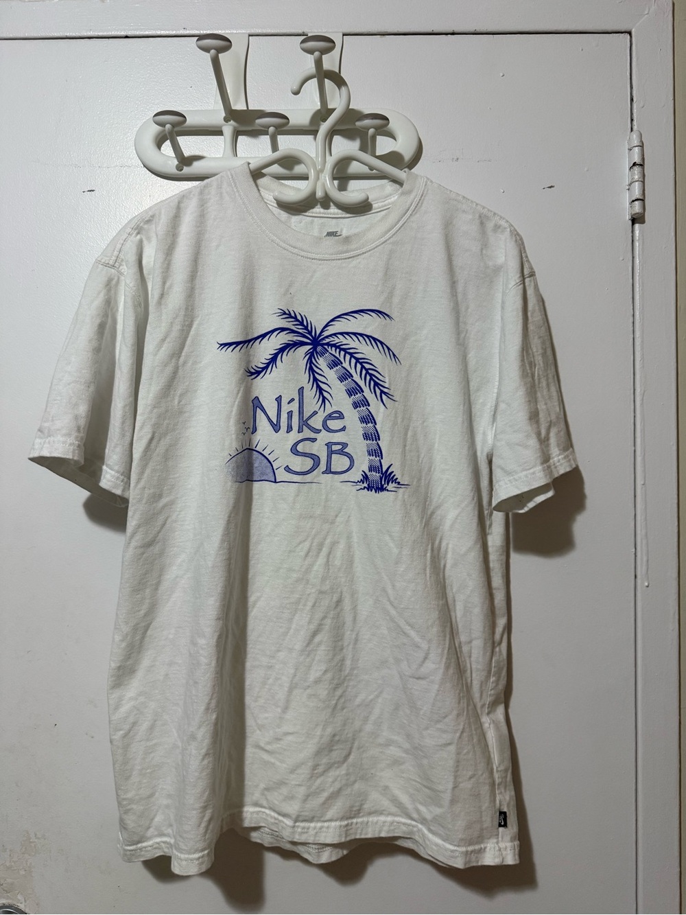 Nike White Short Sleeve T-Shirt with Blue Palm Graphic